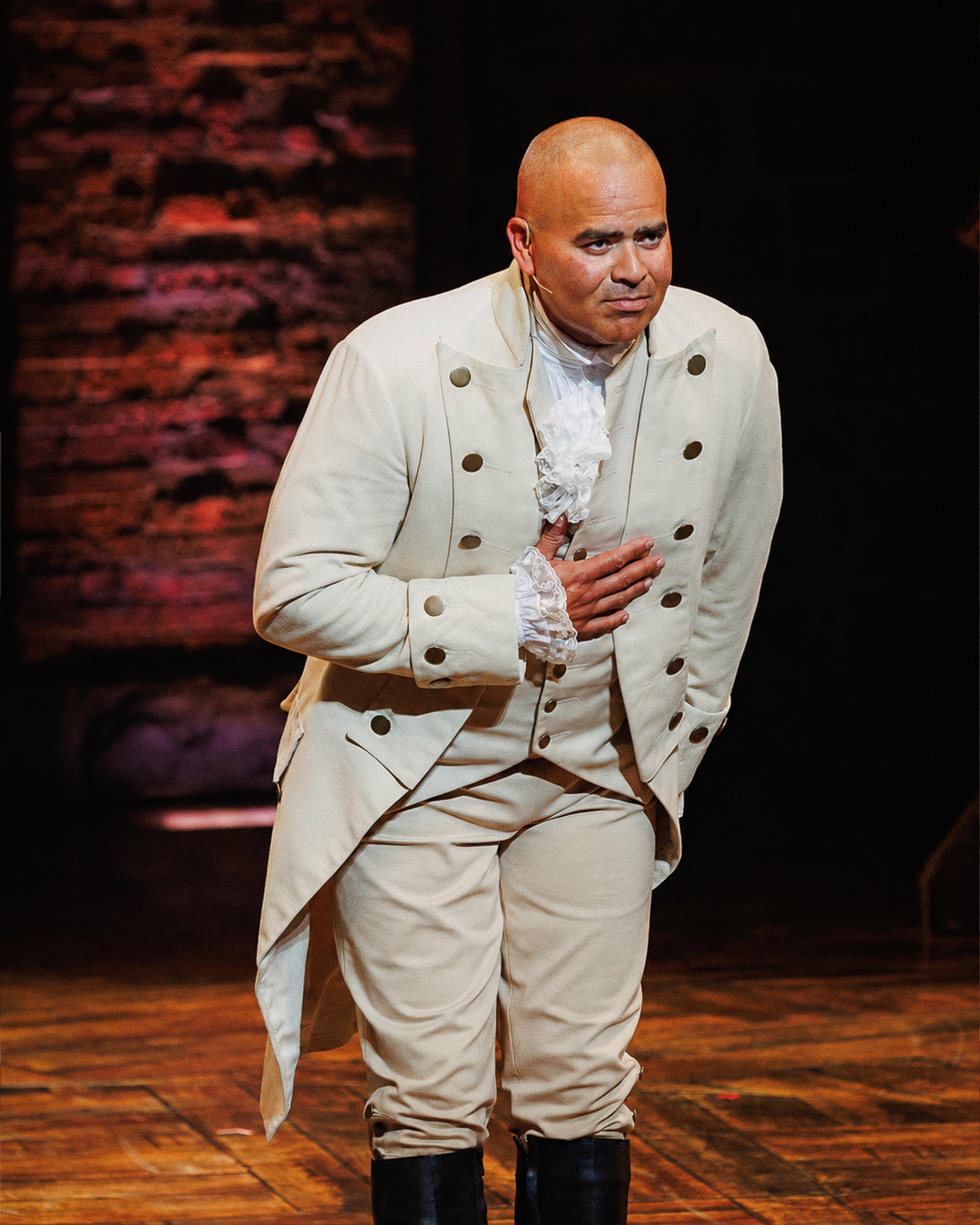 Christopher Jackson taking a bow as George Washington in Hamilton