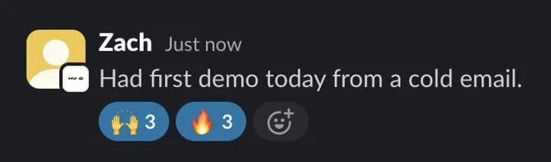 Slack screenshot from Zach: 1st demo from cold email