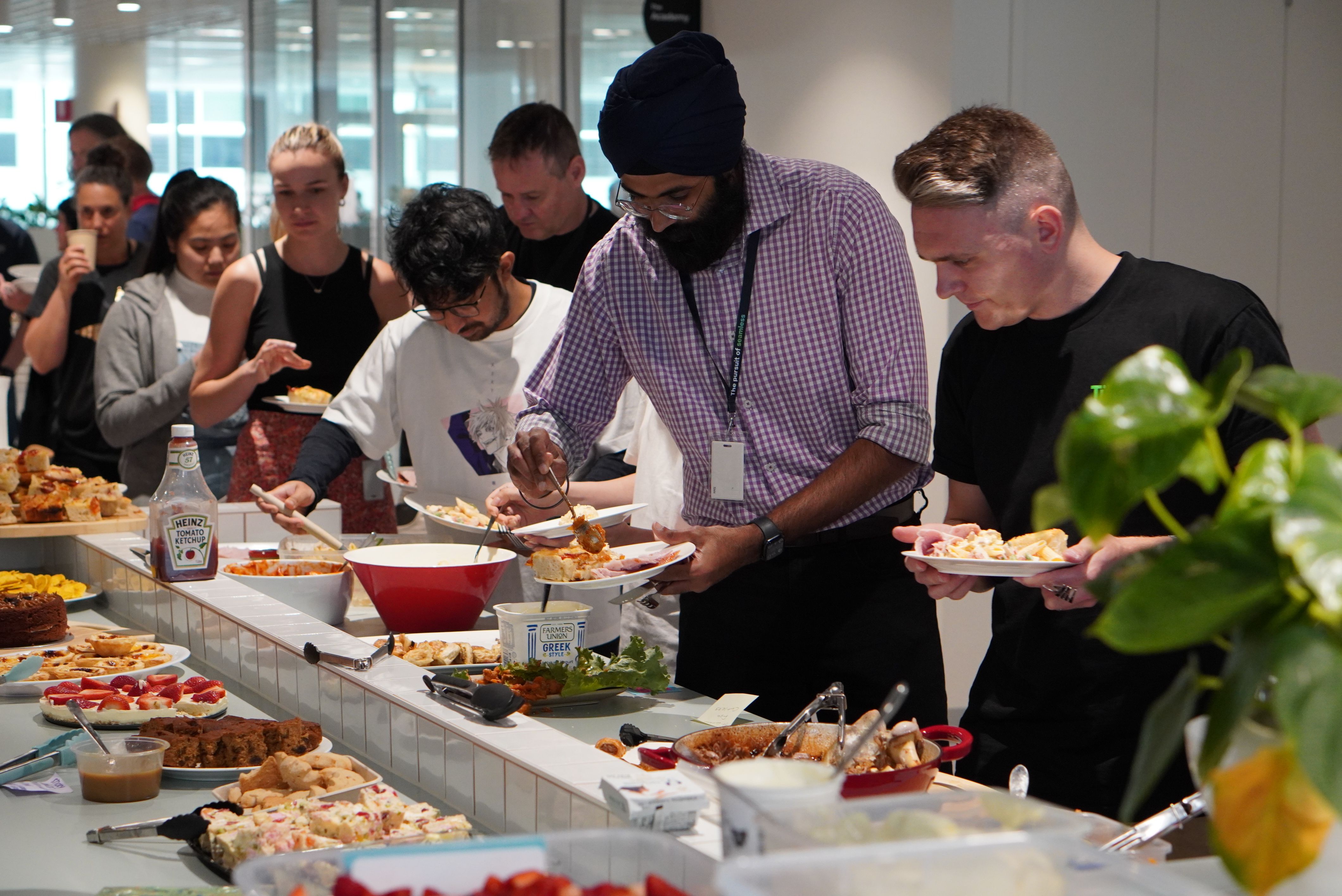 A group of Tiimely employees sharing a lunch