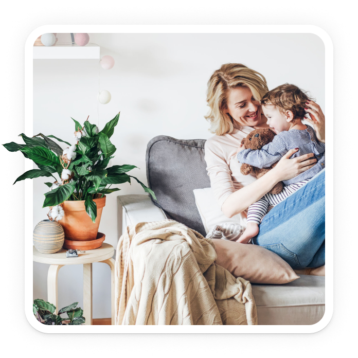 Mother and child together on armchair