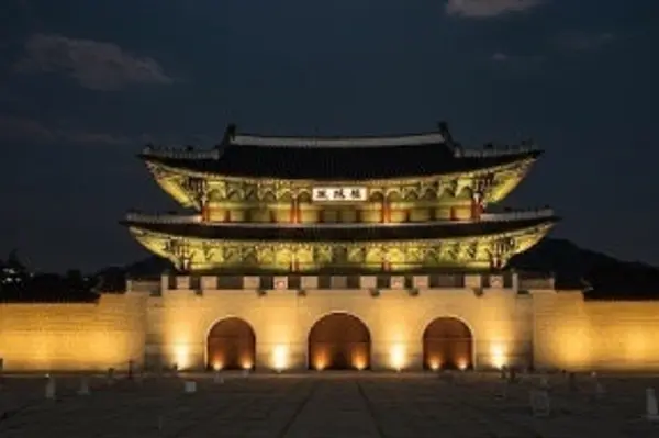 Gwanghwamun Gate at Gyeongbokgung Palace illuminated against the night sky in Jongno, Seoul