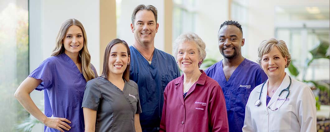 Group of nurses, doctor and and volunteer