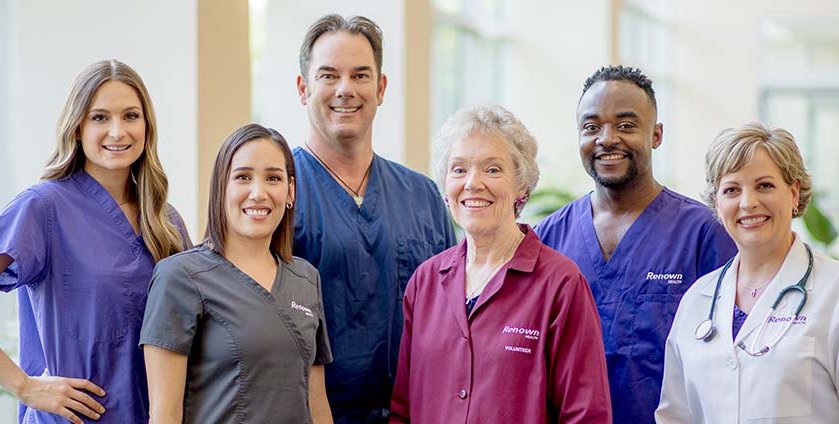 Group of nurses, doctor and and volunteer