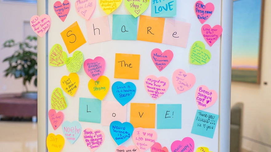"Share the Love" sticky notes on a sign at Renown Health