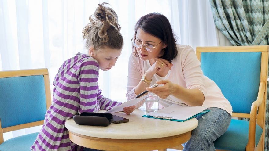 Licensed Clinician working with young girl
