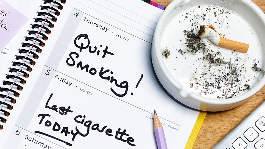 A calendar with the words, "Quit Smoking! Last cigarette today!"