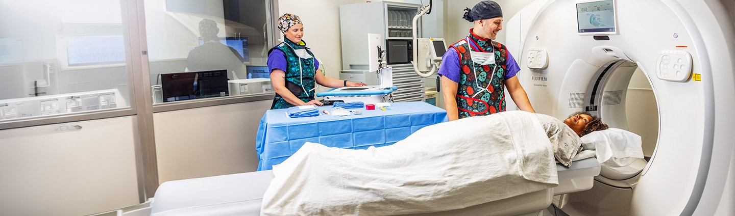 Renown providers assisting patient in MRI