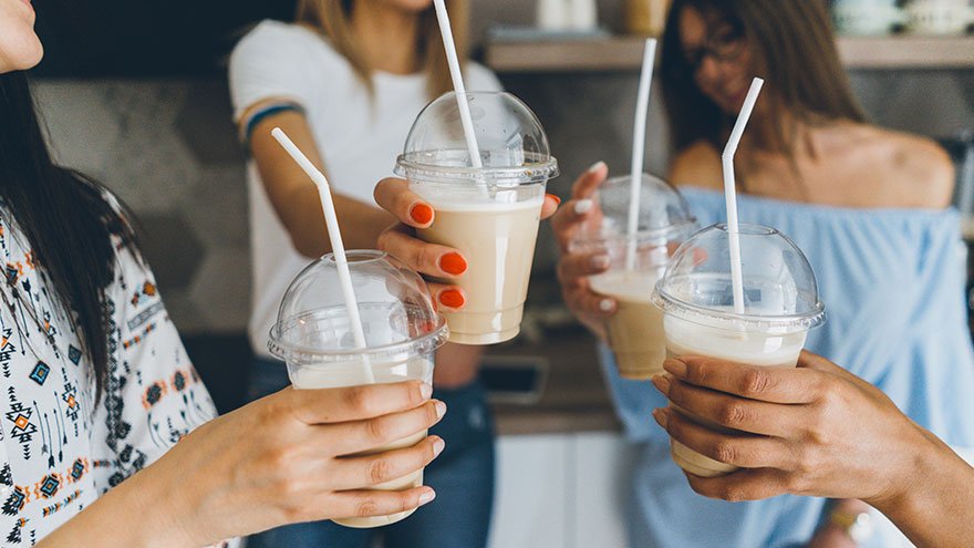 Young women enjoying coffee at Starbucks
