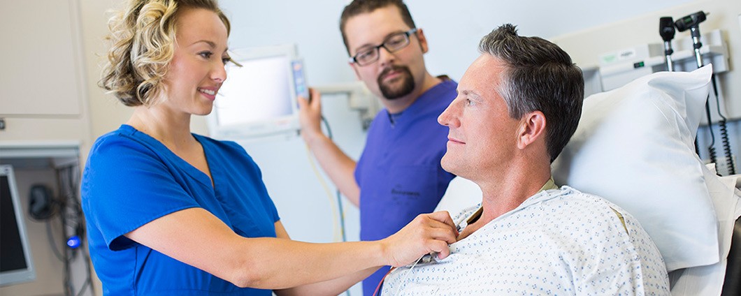 Nurses attending to patient in the ER