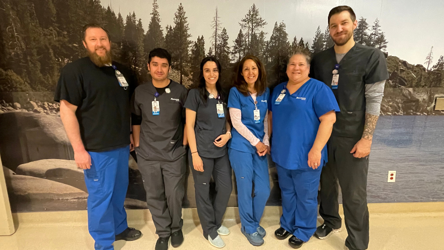 A group of imaging professionals at Renown pose for a group photo.