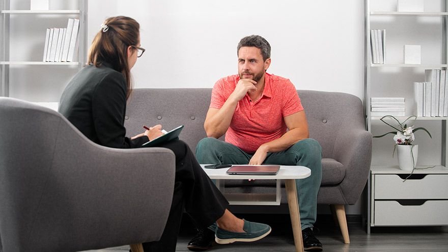 Psychiatrist in session with patient