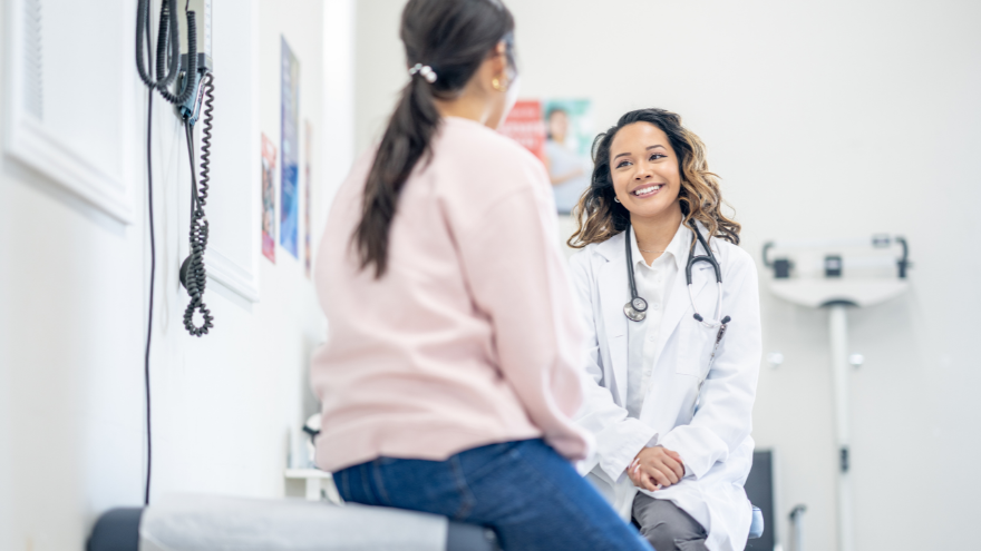 women doctor with female patient