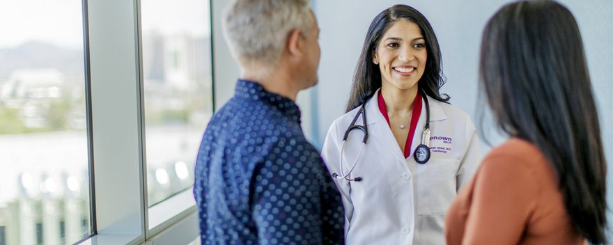 Dr. Danish Atwal speaking with patients