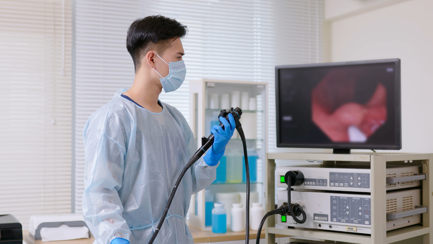 Doctor performing colonoscopy