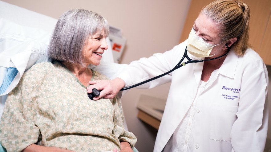 Doctor inspecting a patient 