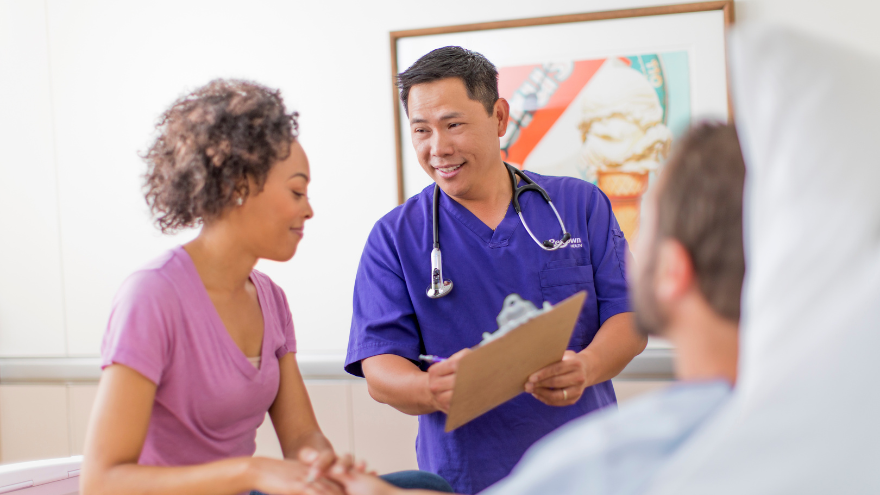 Renown Health ER nurse guides a patient and visitor through emergency care treatment