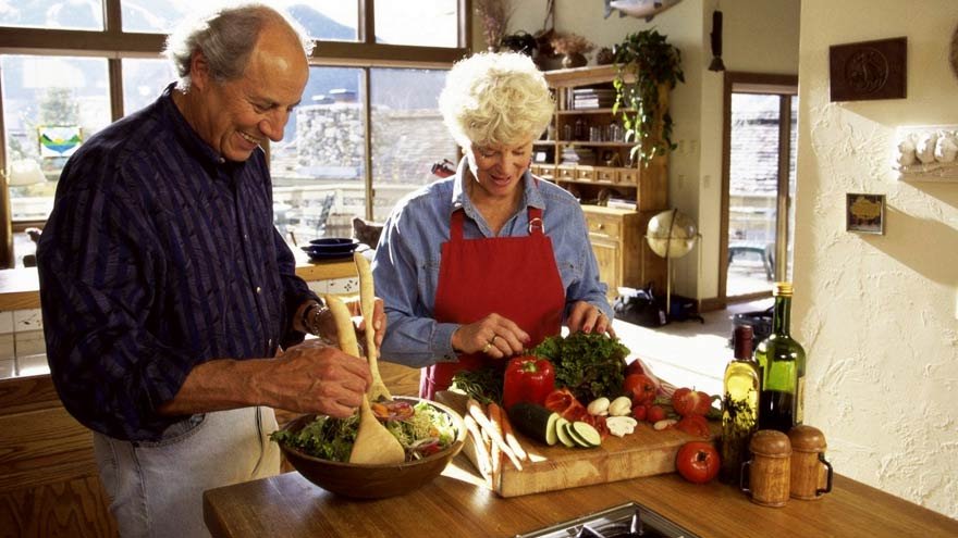 A couple looking at vegetables