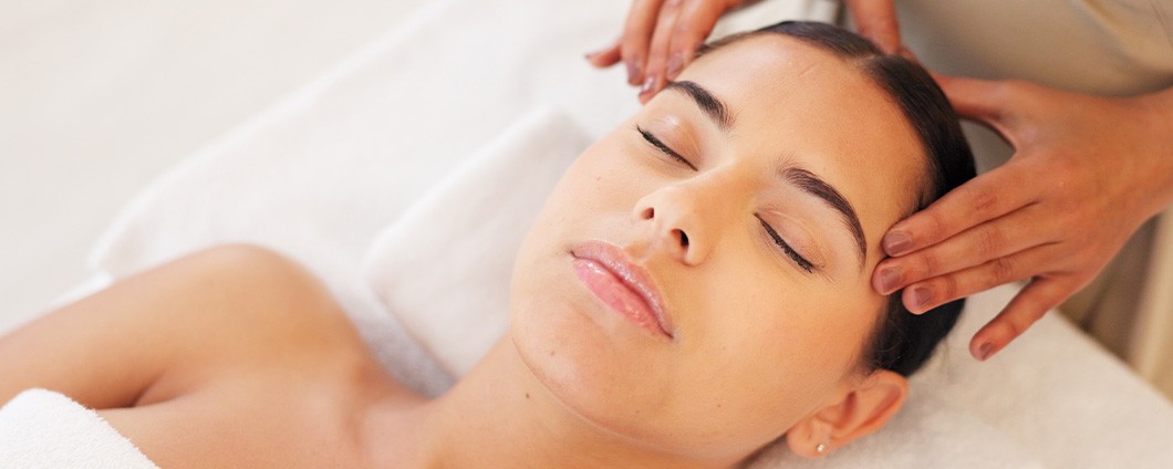 Woman receiving a facial from a licensed dermatologist