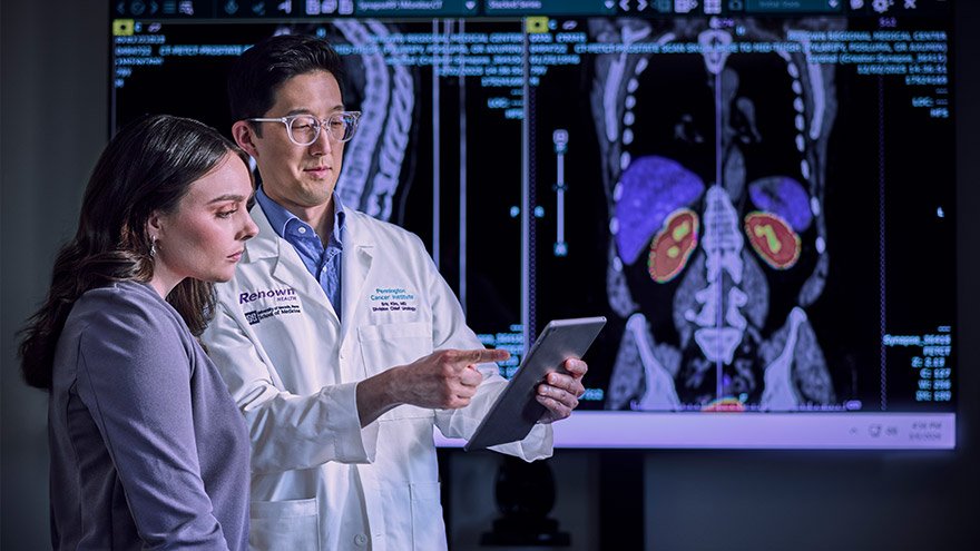 Dr. Eric Kim shows imaging results on an iPad