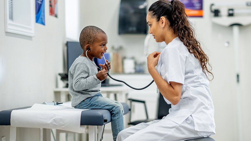 Nurse and child patient sharing a moment