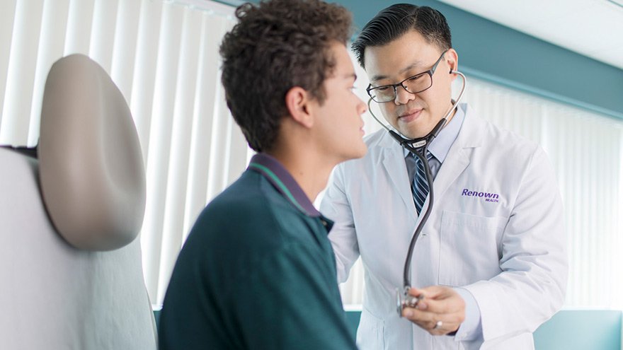 Renown provider examining young patient