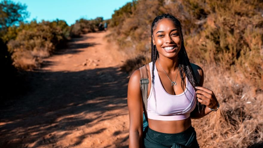 Woman hiking on trail