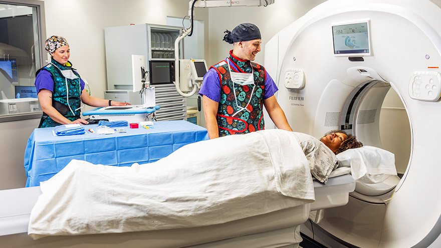 Renown provider assisting patient during scan