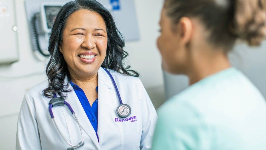 Physician smiles at patient