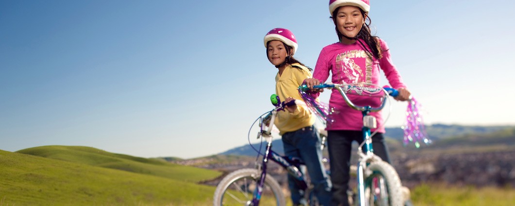 Two young girls riding bikes in Reno, Nevada