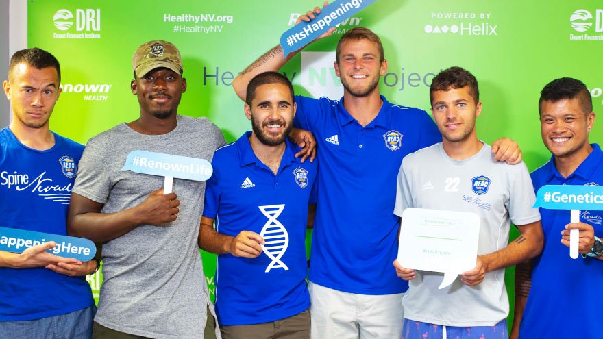 A group of men smiling 