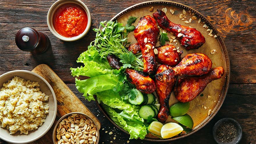 Chipotle chicken with vegetables, nuts and quinoa