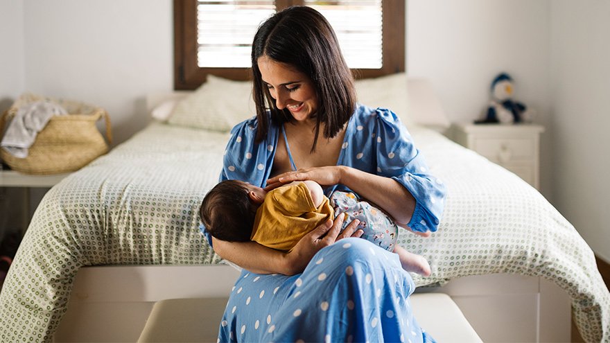 Mom breastfeeding baby