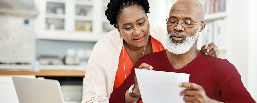 Couple paying their bills online