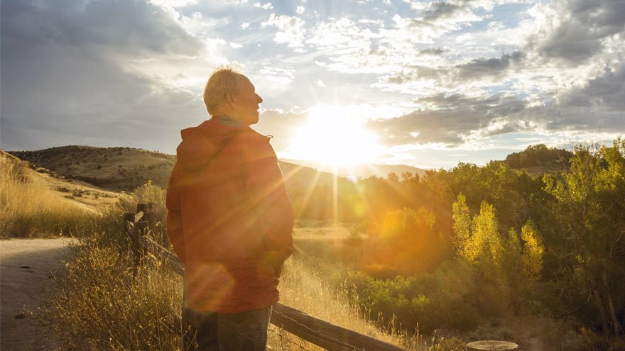 Man hiking at sunset