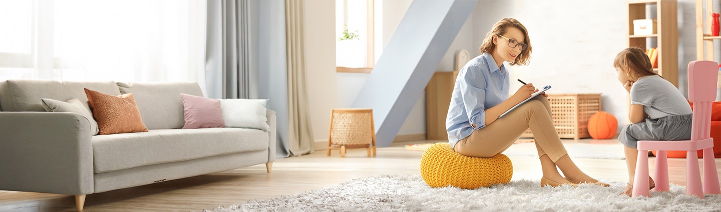 Therapist engaging with child during therapy session