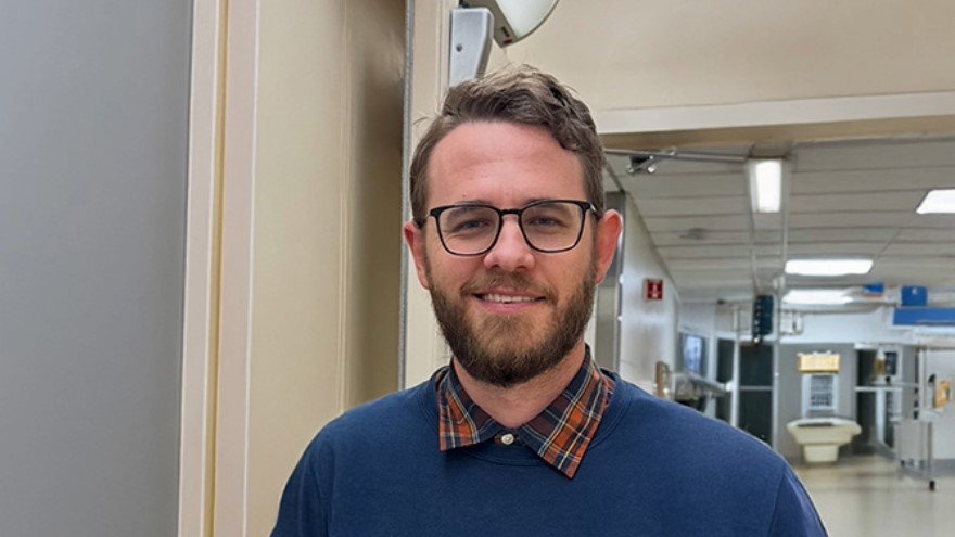 Case Manager Stands in Hospital Hallway at Renown Health