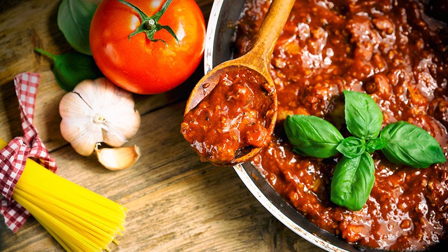 Spaghetti Sauce in the Pot on the wooden table