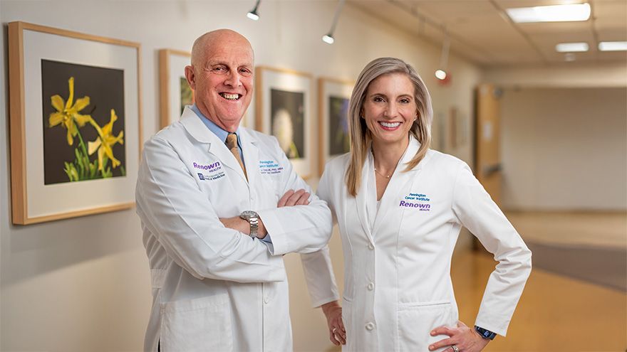 Renown providers, Dr. Coppes and Dr. Ward posing in hallway