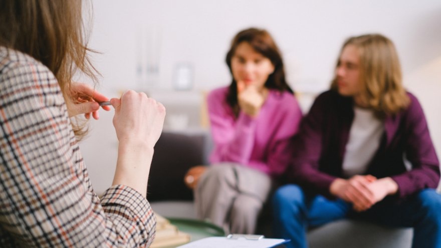 Therapist in session with couple