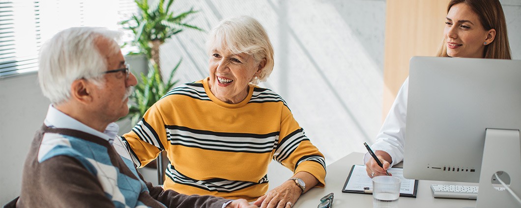 Couple consulting with a clinical research provider