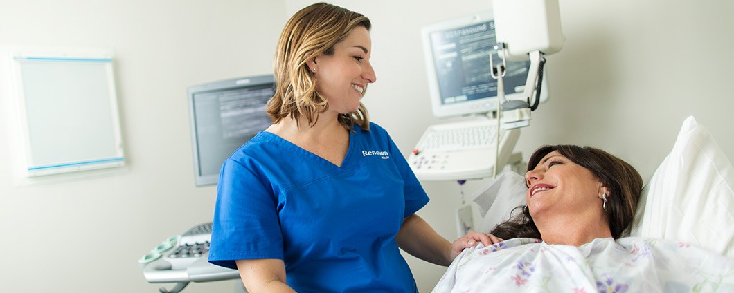 Renown provider assisting patient with mammogram