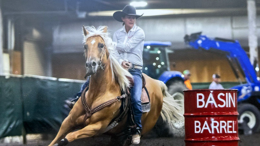 Renown Radiation Therapist Haley Longfield on her horse Hershey at a barrel race