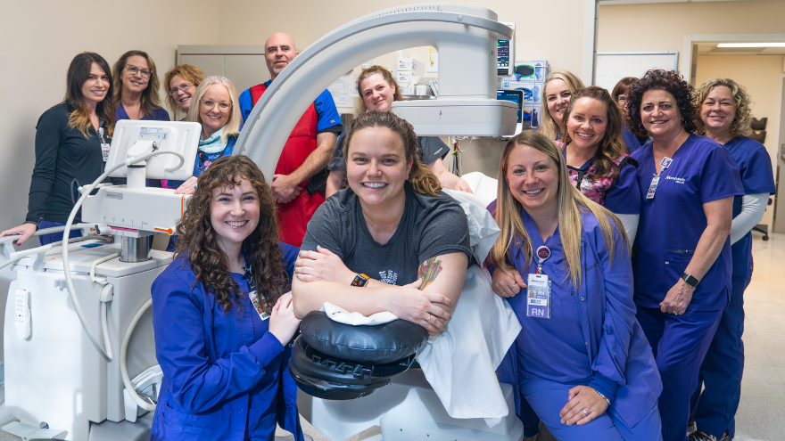 The Special Procedures Pain Management team at Renown Rehabilitation Hospital pose for a photo in a treatment room.