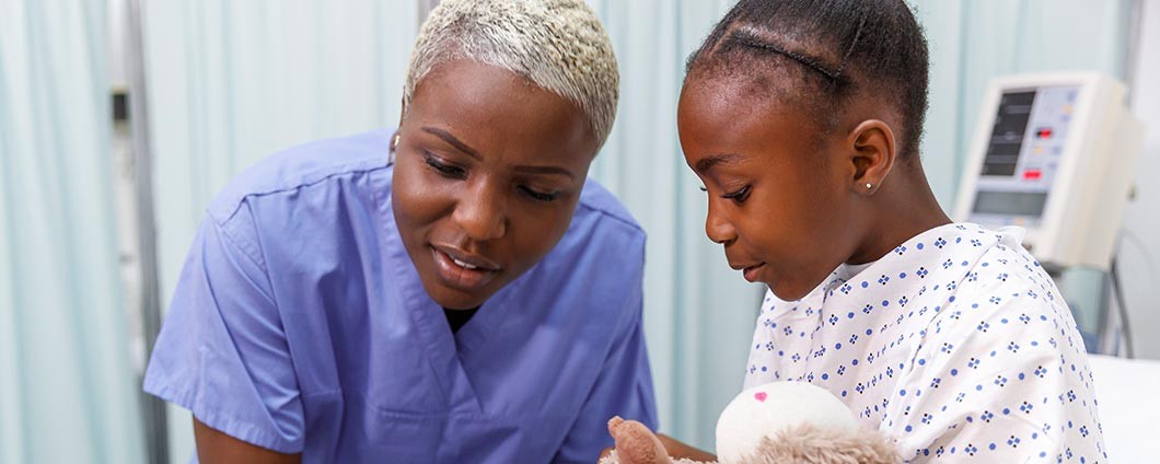 provider with child in PICU