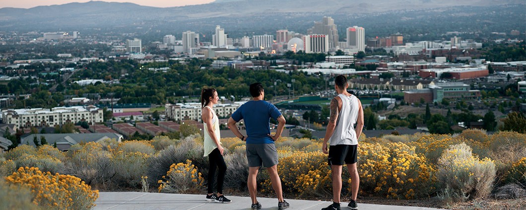 Joggers looking out at Reno, NV