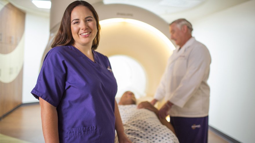 Renown MRI technician with patient and provider
