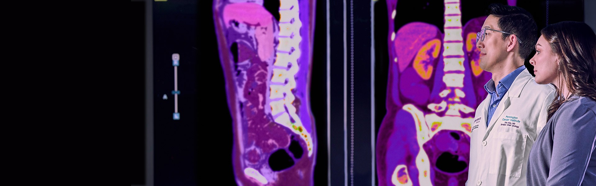 Renown professionals stand in front of large imaging screen