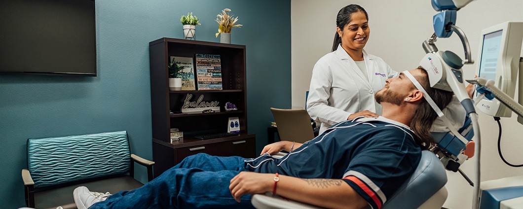 Gunjan Lehil, MD treating patient
