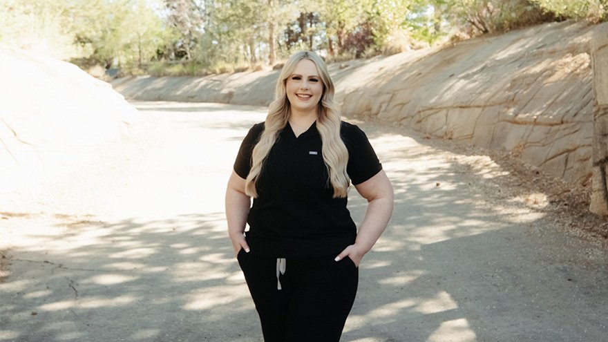 Jill Parker posing for photo outdoors.