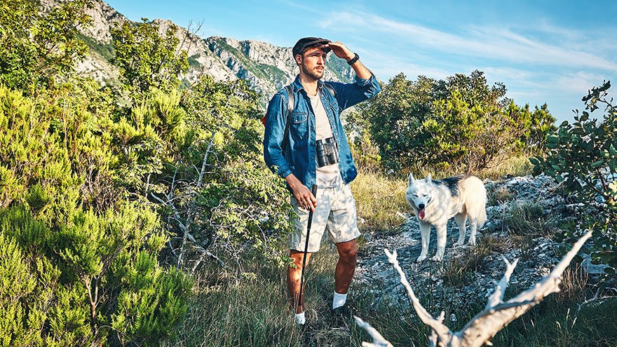 Man hiking with his dog